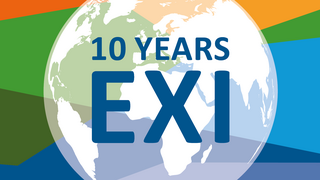 white globe on colourful background with '10 years exi" on it